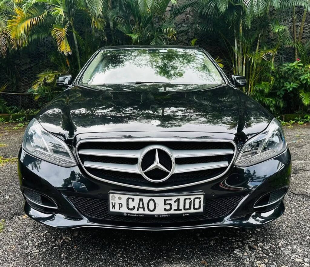 Mercedes-Benz E220 2014 black exterior front view luxury sedan Sri Lanka