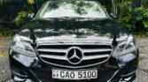 Mercedes-Benz E220 2014 black exterior front view luxury sedan Sri Lanka